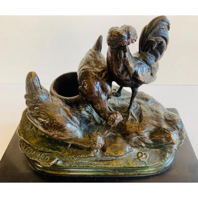 Two Hens And A Rooster Watching A Worm